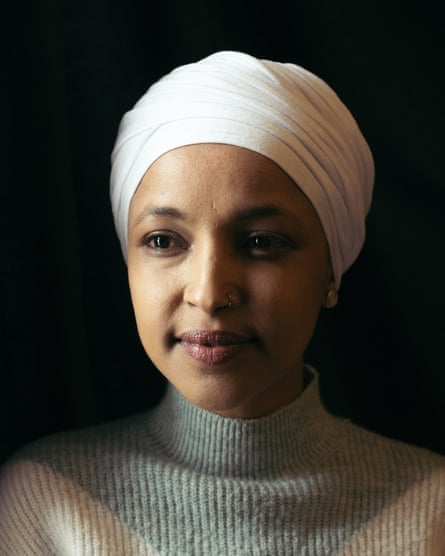 a woman looking at a camera