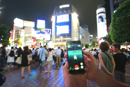 People play Pokémon Go in Tokyo, Japan.