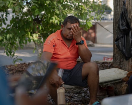 Gabriel González sitting with his head in his hand