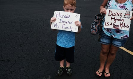 Derrick Slaughter attends the Hope Not Heroin march, through the streets of Norwalk, Ohio, with his grandmother on 14 July 2017 in Norwalk, Ohio.