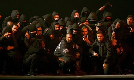 Kanye West performs All Day at the 2015 Brit awards with a host of UK grime artists.