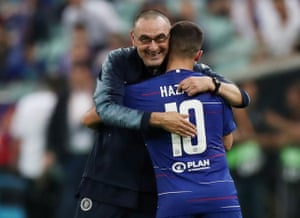 Chelsea’s Eden Hazard is embraced by manager Maurizio Sarri after being is substituted off.