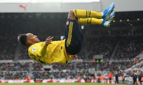 Pierre-Emerick Aubameyang celebrates his winning goal in typically acrobatic fashion.