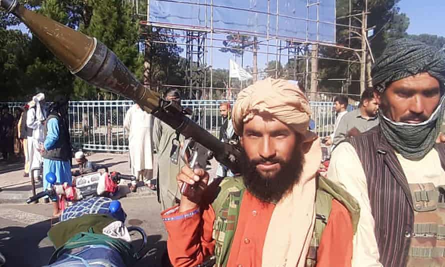 A Taliban fighter, armed with a rocket-propelled grenade, enters Herat, Afghanistan’s third biggest city.
