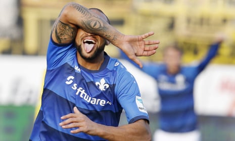 Darmstadt’s Terrence Boyd celebrates after scoring the opening goal against Borussia Dortmund.