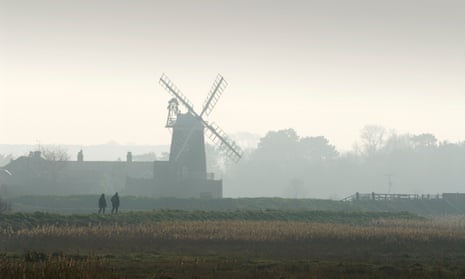 A windmill in the mist at Cley marshes.