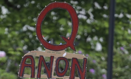 A QAnon sign at a protest in the US. Australia has the second largest group of Qanon followers outside the US.
