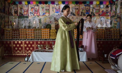 Rituals and resistance … shaman Min Hye-Gyeong, centre, in Yangju, Korea