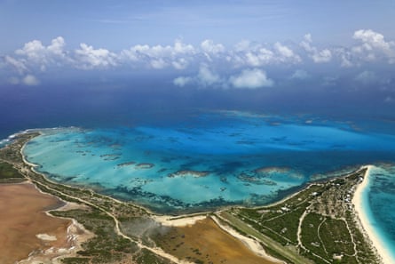 Aerial view of white sand beaches on the coast of Barbuda