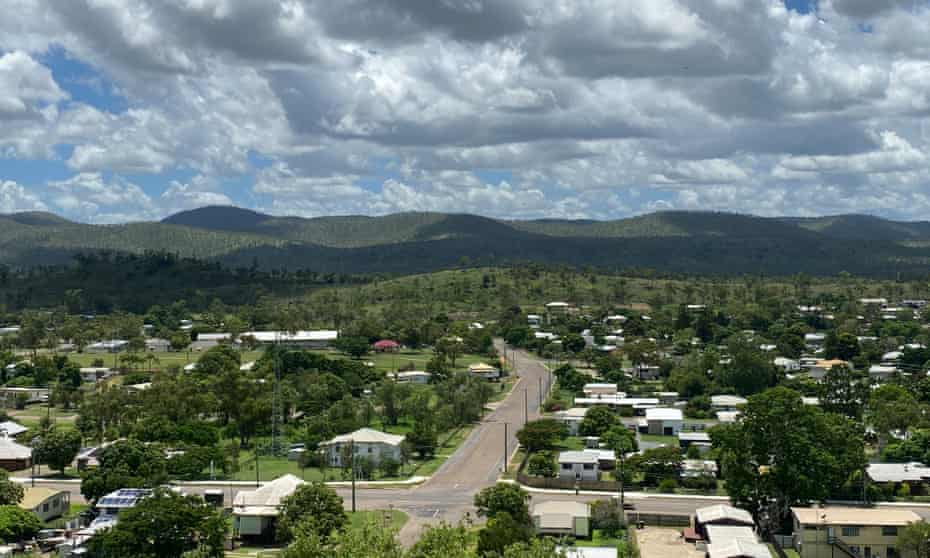 A view over houses and roads in Collinsville with hills in the background.