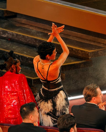 Teyana Taylor applauds as Amy Madigan wins best supporting actress.