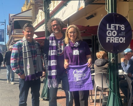 WA Greens senator Brad Pettitt, City of Fremantle mayor Ben Lawver and Fremantle Labor MP Simon McGurk show their true colours before the AFL semi-final between Fremantle and Geelong
