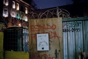 A street sign at the protest reads: âAbort the patriarchy.â