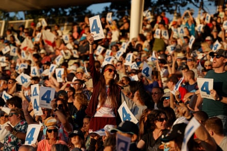 England fans celebrate a boundary during the easy victory over New Zealand in the women’s T20 cricket.