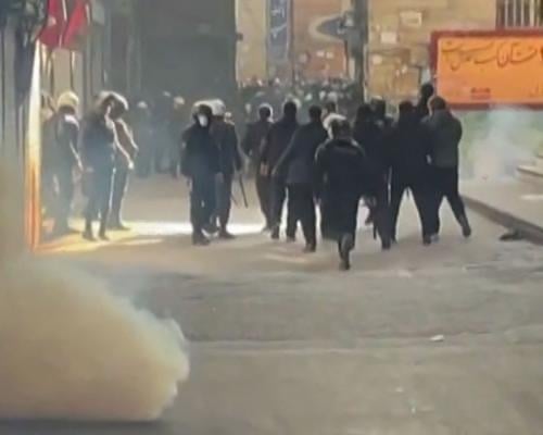 Iranian security forces clash with protesters at Tehran's grand ...
