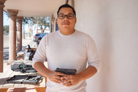 salas holds handgun