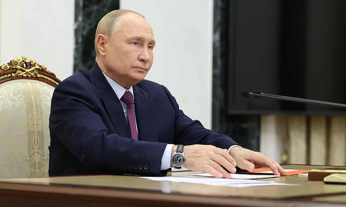 Vladimir Putin at desk