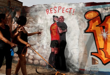 A mural in Barcelona shows suspended RFEF president Luis Rubiales kissing Spain player Jenni Hermos on the lips.