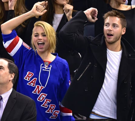 Margot Robbie with husband Tom Ackerley at an ice hockey game in New York in 2015