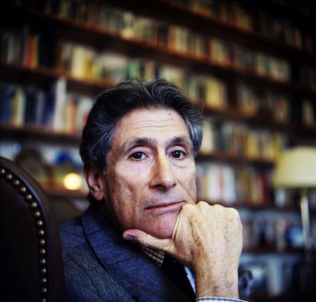 a man rests his chin on his hand