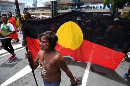 An Indigenous boy on a march through central Brisbane on Invasion Day, AKA Australia Day, in 2017.