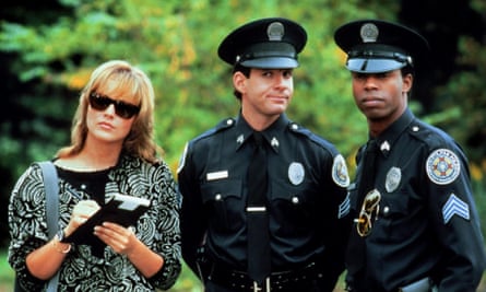 Guttenberg as Mahoney with Sharon Stone and Michael Winslow in Police Academy 4: Citizens on Patrol 1987.