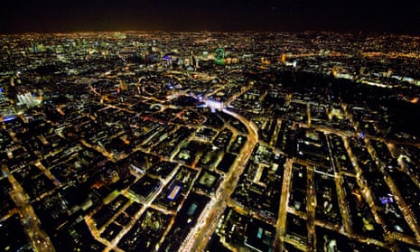 an aerial view of Central London at night.
