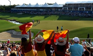 Spanish fans celebrate after Rahm sinks the winning birdie putt.