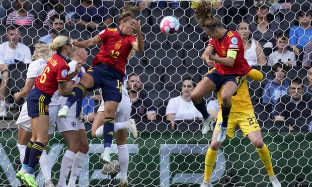 Irene Paredes (right) heads Spain’s equaliser.