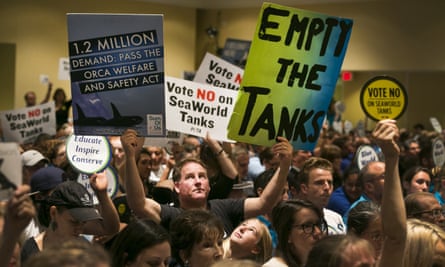 Opponents and supporters of SeaWorld fill the room during a California Coastal Commission meeting in Long Beach, California.