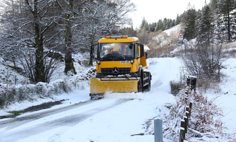 A snowplough on a road near Glencoe, Scotland