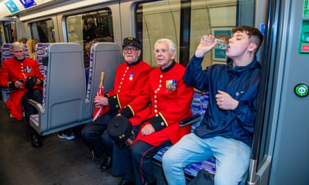 Chelsea pensioners, Geoffrey Read, Peter Fullelove and Chris O’ Connor travelling on the first Elizabeth line train