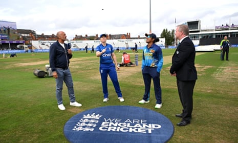 England captain Heather Knight tosses the coin as Sri Lanka’s captain Chamari Athapaththu looks on before their ODI match.