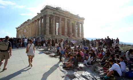 Huge groups of tourists at the Acropolis in Athens, Greece