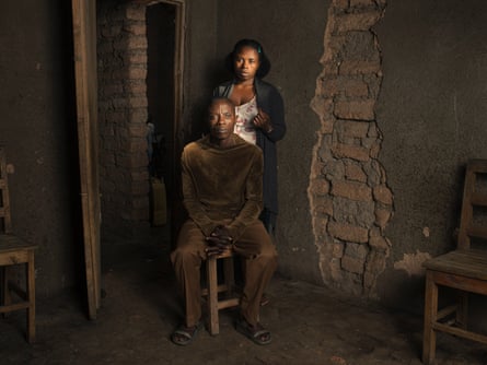 Solange Uwamahirwe (standing), whose father took part in killings during the Rwandan genocide, with Elie Zmanizaboyo, who saw both her parents killed