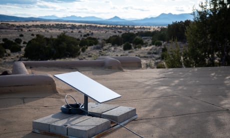 a satellite receiver on a rooftop