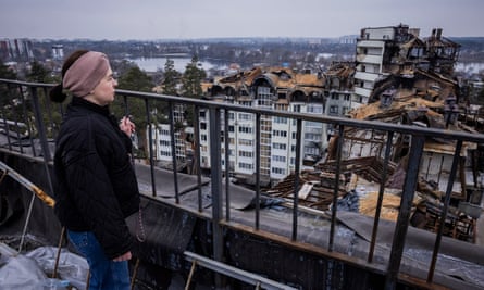 Destroyed blocks of flats surround Psariova’s apartment in Irpin