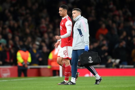 William Saliba goes off after picking up an injury.