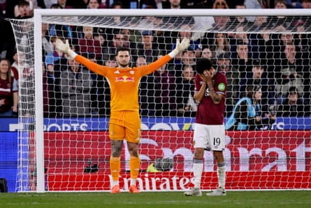 West Ham's Pablo looks dejected aft missing a punishment during shootout against Leeds.