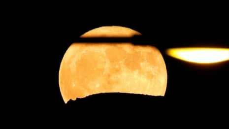 Buck full supermoon illuminates skies around the world – video