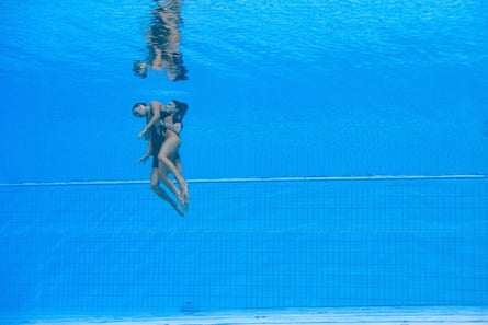 USA’s Anita Alvarez is recovered from the bottom of the pool by a team member after she became unconscious during the women’s solo free artistic swimming finals in Budapest 2022 World Aquatics Championships at the Alfred Hajos Swimming Complex in Budapest on June 22, 2022