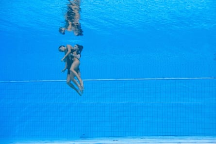 USA’s Anita Alvarez is recovered from the bottom of the pool by a team member after she became unconscious during the women’s solo free artistic swimming finals in Budapest 2022 World Aquatics Championships at the Alfred Hajos Swimming Complex in Budapest on June 22, 2022