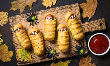 Scary sausage mummies wrapped in pastry bandages