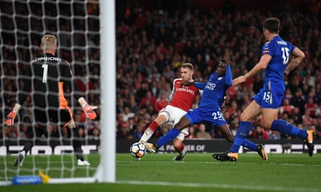 Aaron Ramsey shoots past Wilfred Ndidi to score his team’s third.