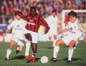 George Weah of AC Milan takes on the Parma defence during their Serie A match at the Ennio Tardini Stadium, Parma in November 1995