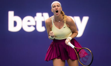Petra Kvitova celebrates winning a point against Sorana Cirstea