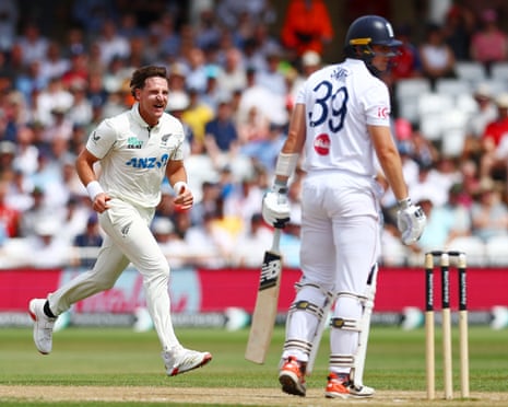 Nathan Smith of New Zealand celebrates taking the wicket of Jamie Smith of England.