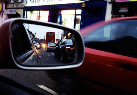 A London traffic jam reflected in a car mirror