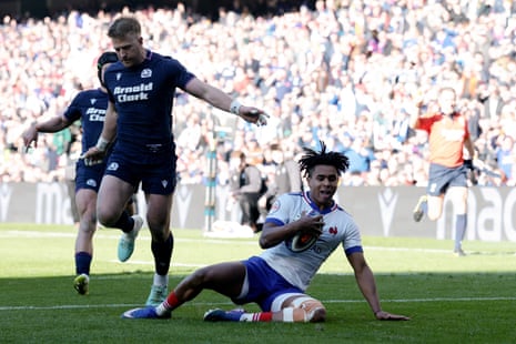 Theo Attissogbe of France scores his team's second try.