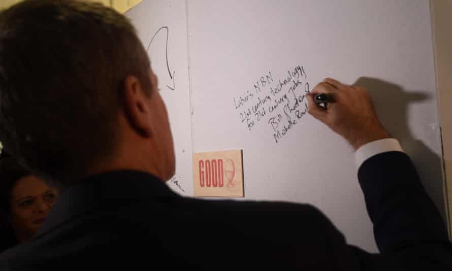 Bill Shorten leaves a campaign message as whiteboard graffiti at The Good Egg photographic studio in Riverstone.